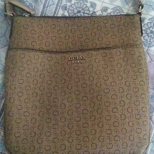 The brand is Guess,color is brown